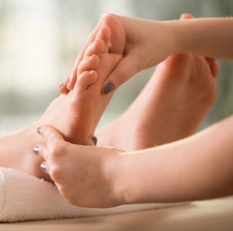 Indulge in a serene experience at YOLOve Beauty Spa in Dartmouth. Enjoy the soothing benefits of a rejuvenating foot massage where skilled hands gently press and relax your feet. The calming ambiance, highlighted by soft backgrounds, enhances tranquility and wellness. Treat yourself to ultimate relaxation and leave revitalized with beautifully polished nails in soothing gray hues.